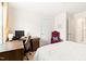 Cozy bedroom with a workspace, comfortable chair, and a well-lit, inviting atmosphere at 2512 Lily Dr, Haw River, NC 27258