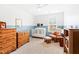 Charming Bedroom featuring a crib, rocking chair, and ample storage, creating a sweet, comforting space at 2512 Lily Dr, Haw River, NC 27258