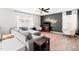 Inviting living room with comfortable seating, modern décor, and a large window that let in lots of light at 2512 Lily Dr, Haw River, NC 27258