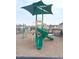 Community playground with green slide, shade cover, and other structures at 2512 Lily Dr, Haw River, NC 27258
