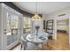 Bright dining area with backyard views and a stylish pendant light at 2514 Mcgowan Ct, Wake Forest, NC 27587