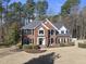 Traditional brick home with mature landscaping and a well-manicured lawn, offering timeless curb appeal at 2514 Mcgowan Ct, Wake Forest, NC 27587