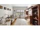 Bright home office features hardwood floors, a large window, comfortable seating, and built-in desk with storage at 2514 Mcgowan Ct, Wake Forest, NC 27587