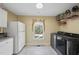 Laundry room with window, utility sink, and washer and dryer at 2514 Mcgowan Ct, Wake Forest, NC 27587