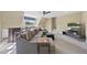 Comfortable living area with a large sectional sofa, tv, bar, and plenty of natural light at 2514 Mcgowan Ct, Wake Forest, NC 27587