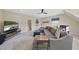 Comfortable living area with a large sectional sofa, tv, and plenty of natural light at 2514 Mcgowan Ct, Wake Forest, NC 27587