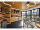 Bright sunroom with wooden accents, a ceiling fan, and a built-in wet bar at 2514 Mcgowan Ct, Wake Forest, NC 27587