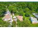 Aerial view of a neighborhood with tree-lined streets and well-maintained homes at 2616 Bullock Rd, Durham, NC 27704