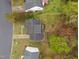 Aerial view of a home with a spacious backyard and patio, offering outdoor living and entertainment space at 2825 Alder Ridge Ln, Raleigh, NC 27603