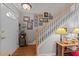 Inviting foyer featuring a staircase, wood floors, and stylish decor at 2825 Alder Ridge Ln, Raleigh, NC 27603