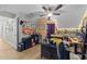 Versatile living space with desks and unique decor, suited for study or hobbies at 2825 Alder Ridge Ln, Raleigh, NC 27603