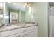 Bathroom featuring double sink vanity, a large mirror, and modern fixtures at 297 Lane Store Rd, Franklinton, NC 27525