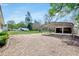 Expansive backyard features an outbuilding providing extra storage space and workspace at 309 W Parrish Dr, Benson, NC 27504
