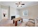 Cozy living room features a fireplace, built-in shelving, and comfortable seating area at 309 W Parrish Dr, Benson, NC 27504