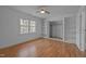 Cozy bedroom with built-in shelves, closet, and natural light perfect for relaxing at 311 Lilliput Ln, Wake Forest, NC 27587