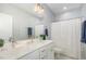 Bright bathroom with a double sink vanity, modern fixtures, and ample storage for convenience at 332 Tumbling River Dr, Wendell, NC 27591
