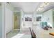 Bright bathroom featuring a soaking tub, separate shower, and dual sinks for convenience and comfort at 406 Southshore Pkwy, Durham, NC 27703