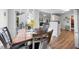 Cozy dining area filled with natural light featuring a view of the outdoor space and an open layout at 406 Southshore Pkwy, Durham, NC 27703