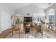 Spacious living room with vaulted ceiling, hardwood floors, and natural light at 406 Southshore Pkwy, Durham, NC 27703