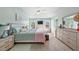 Spacious main bedroom boasts large windows, soft natural light, and a calm, inviting atmosphere at 406 Southshore Pkwy, Durham, NC 27703