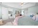 Serene main bedroom with tray ceilings, and a connecting ensuite bathroom for added comfort and privacy at 406 Southshore Pkwy, Durham, NC 27703