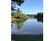 Beautiful water view featuring calm waters and mature trees at 406 Southshore Pkwy, Durham, NC 27703