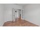 Hardwood flooring, bright white walls, and an airy feel define this multipurpose bonus room at 428 Beaverdam Lake Dr, Fuquay Varina, NC 27526