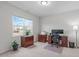 Bright office space with two large windows, wooden furniture, and neutral carpeting at 428 Beaverdam Lake Dr, Fuquay Varina, NC 27526