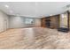 A finished basement with wood-look floors, a fireplace, and lots of space at 4508 Old Us 421 N, Siler City, NC 27344