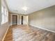 Spacious basement featuring wood flooring, recessed lighting, and ample closet space at 4508 Old Us 421 N, Siler City, NC 27344