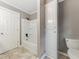 Clean bathroom featuring a shower-tub combo, neutral colors, and built in linen storage at 4508 Old Us 421 N, Siler City, NC 27344