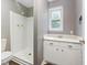 Bathroom featuring a stand up shower and a sink with storage space at 4508 Old Us 421 N, Siler City, NC 27344
