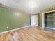 Bedroom with vinyl flooring, neutral paint, and double windows for natural light at 4508 Old Us 421 N, Siler City, NC 27344