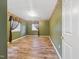 Cozy bedroom with wood-look floors and decorative wallpaper border at 4508 Old Us 421 N, Siler City, NC 27344