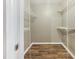 A walk-in closet with built-in wire shelving and wood-look flooring at 4508 Old Us 421 N, Siler City, NC 27344