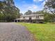 Charming two-story home featuring a spacious front yard and attached two-car garage at 4508 Old Us 421 N, Siler City, NC 27344