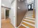 Inviting foyer with wooden staircase, tiled flooring, and a view into other rooms at 4508 Old Us 421 N, Siler City, NC 27344