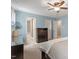 Bedroom with soft blue walls and neutral carpet, bed with nightstands and dresser with mirror at 4725 Sinclair Dr, Raleigh, NC 27616