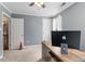 Bedroom with desk and lots of light, perfect for a home office at 4725 Sinclair Dr, Raleigh, NC 27616