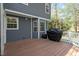 Spacious wooden deck showcases the home's exterior and offers an outdoor living space at 4725 Sinclair Dr, Raleigh, NC 27616