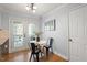Charming dining area with lots of light, with door leading to an outdoor deck at 4725 Sinclair Dr, Raleigh, NC 27616