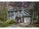 Charming two-story home featuring a well-manicured lawn and attached garage, painted in light blue at 4725 Sinclair Dr, Raleigh, NC 27616