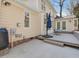 Spacious backyard with a wood deck, an umbrella, and mature trees at 4818 Glendarion Dr, Durham, NC 27713