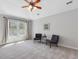 Spacious bedroom with neutral carpet, ceiling fan and natural light at 4818 Glendarion Dr, Durham, NC 27713