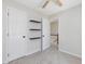 Bedroom featuring an open doorway to a hallway with storage at 4818 Glendarion Dr, Durham, NC 27713