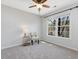 Bright bedroom with a large window and a comfortable seating area at 4818 Glendarion Dr, Durham, NC 27713