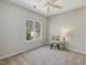 Well-lit bedroom with neutral walls, carpet and a big window at 4818 Glendarion Dr, Durham, NC 27713