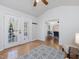 Spacious foyer with hardwood floors, glass doors, a view to the living room, and neutral paint at 4818 Glendarion Dr, Durham, NC 27713