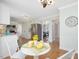 Kitchen featuring stainless refrigerator and eat-in breakfast area at 4818 Glendarion Dr, Durham, NC 27713