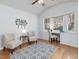 Bright and airy sun room with hardwood floors, lots of natural light, and a vaulted ceiling at 4818 Glendarion Dr, Durham, NC 27713